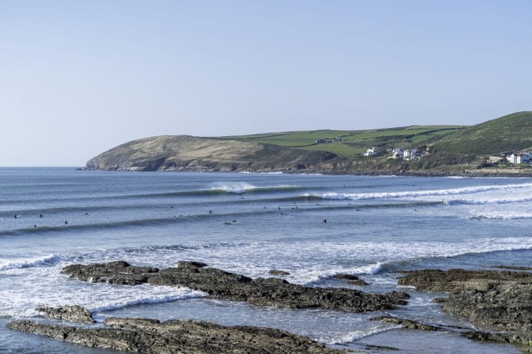 Surfers at Croyde Beach in Devon