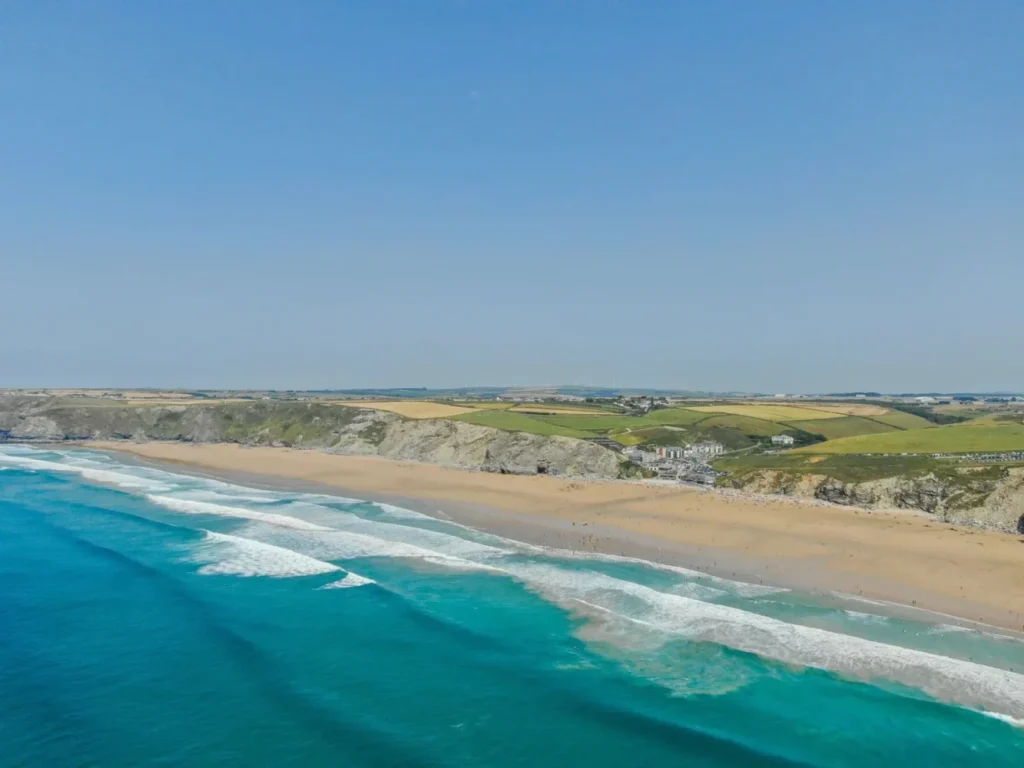 View of the sandy beach at Watergate Bay