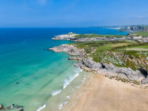 The popular family and surfing beach of Lusty Glaze in Newquay.