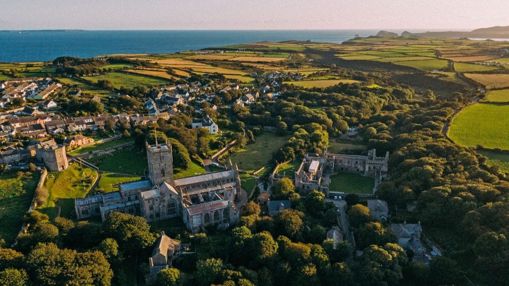 St Davids Cathedral near rugged coastline.