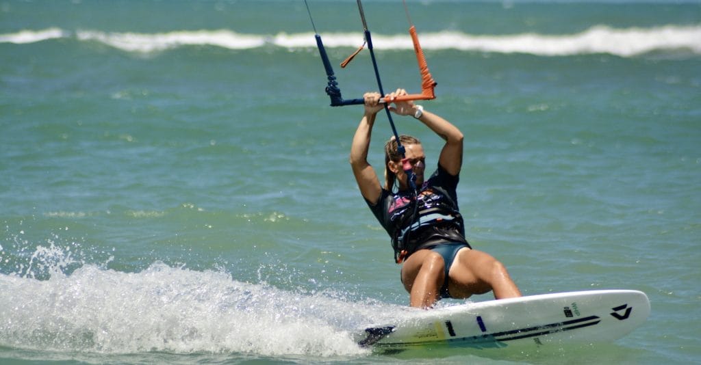 Girl kitesurfing on Sandbanks Beach