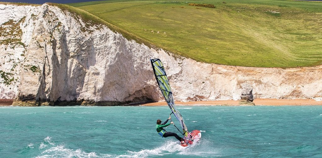 Windsurfing near the beach in Dorset