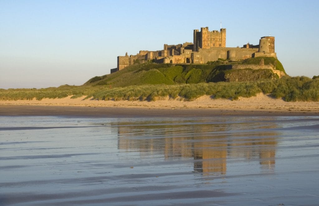 Golden sands and sea views beneath Bamburgh Castle on the Northumberland coast