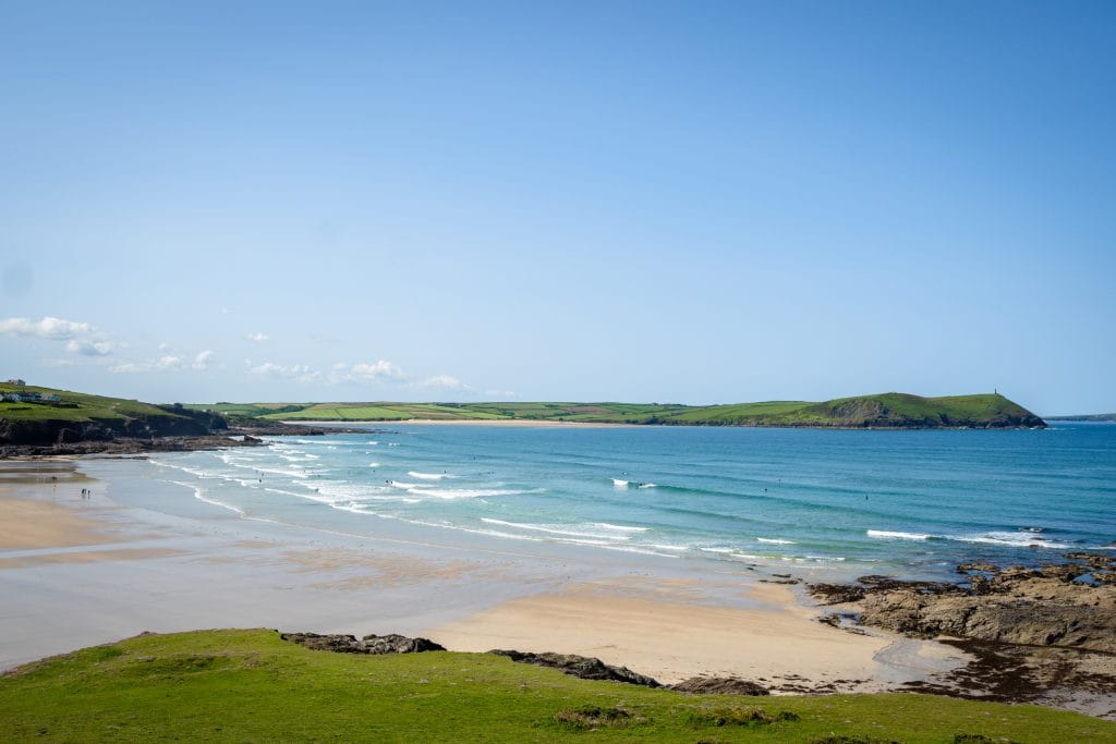 Polzeath Beach Cornwall – beginner surf waves and sandy bay.