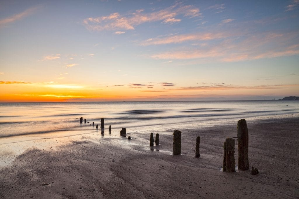 Remains of groynes on the beach at Sandsend, Whitby