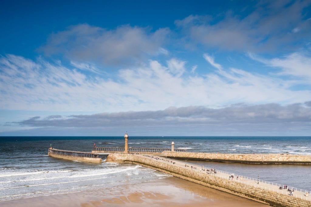 Whitby Harbour and Lighthouses on a sunny day