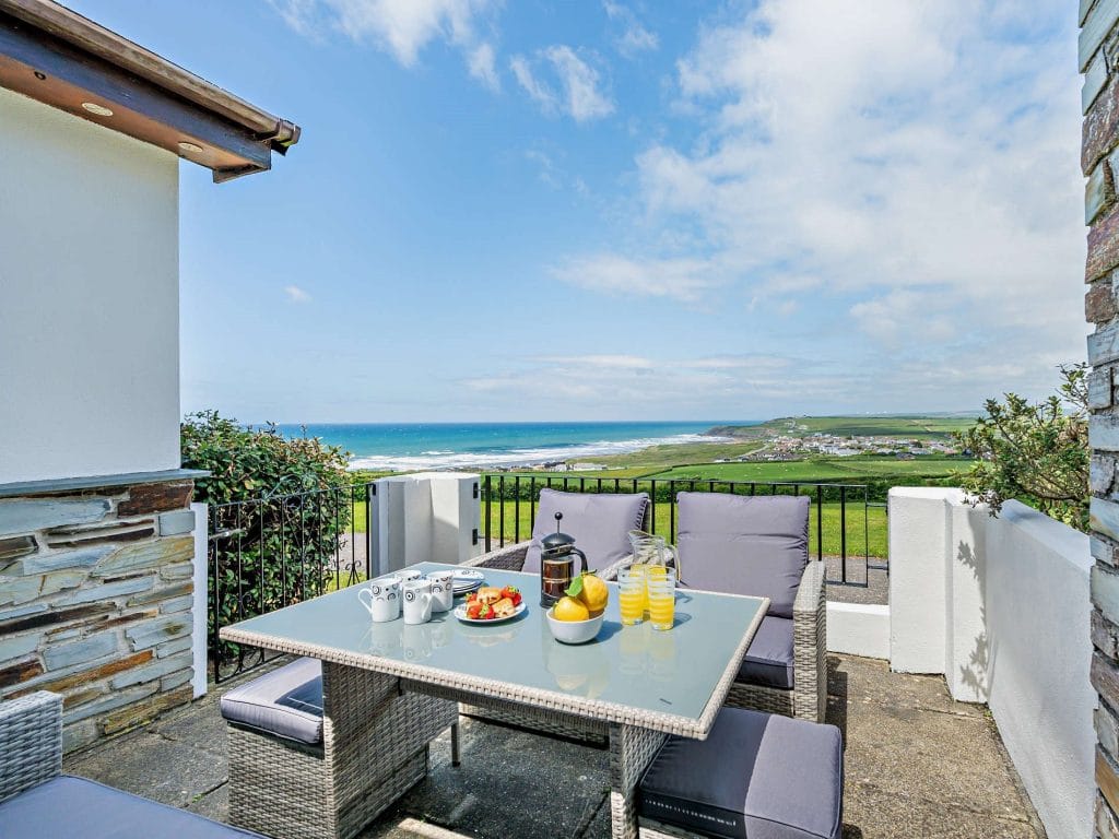 Sea view holiday home in Widemouth Bay with shared swimming pool.