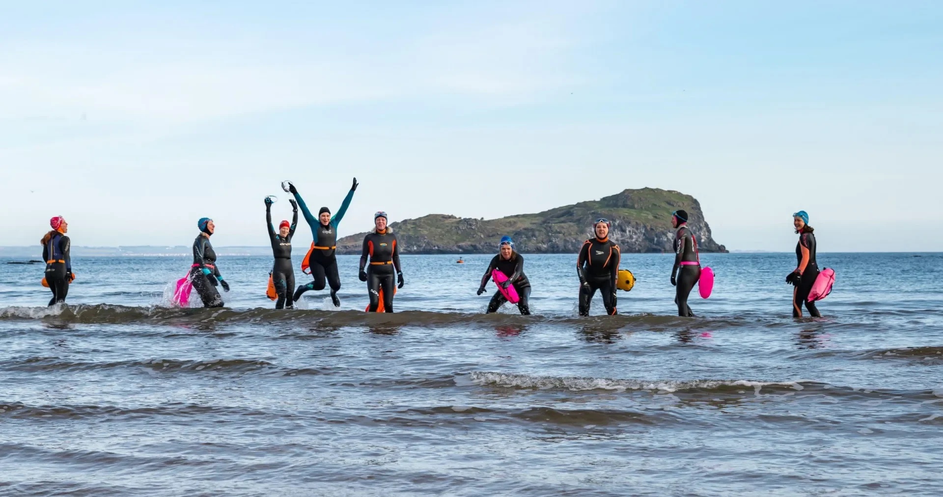 Group of wild swimmers in Scotland