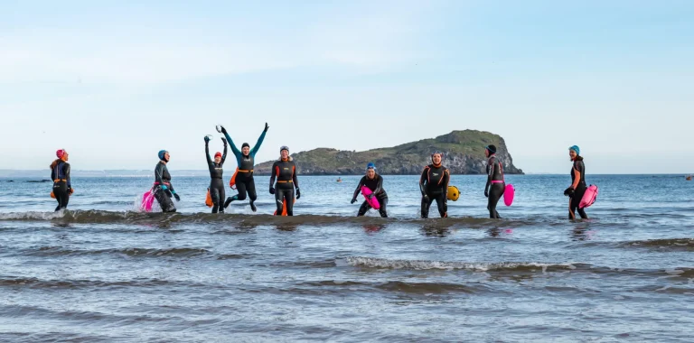Group of wild swimmers in Scotland