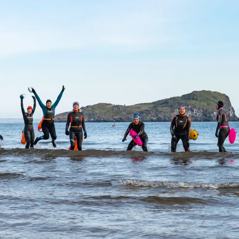 Group of wild swimmers in Scotland