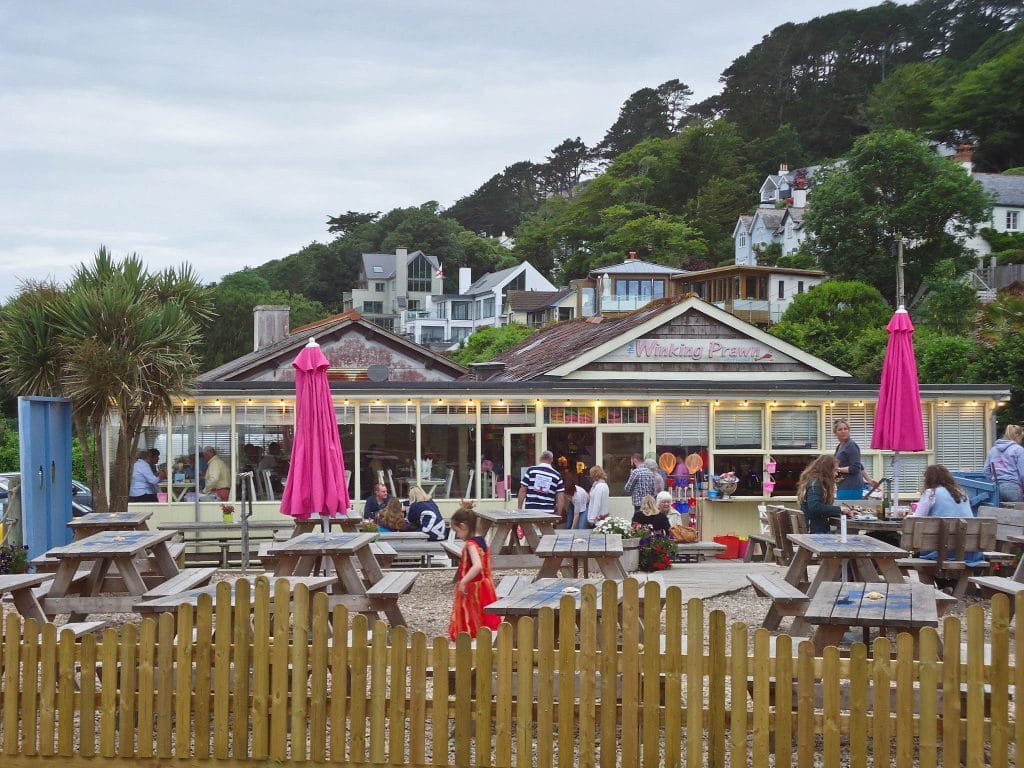 View of the dog friendly Winking Prawn beach cafe in Salcombe.