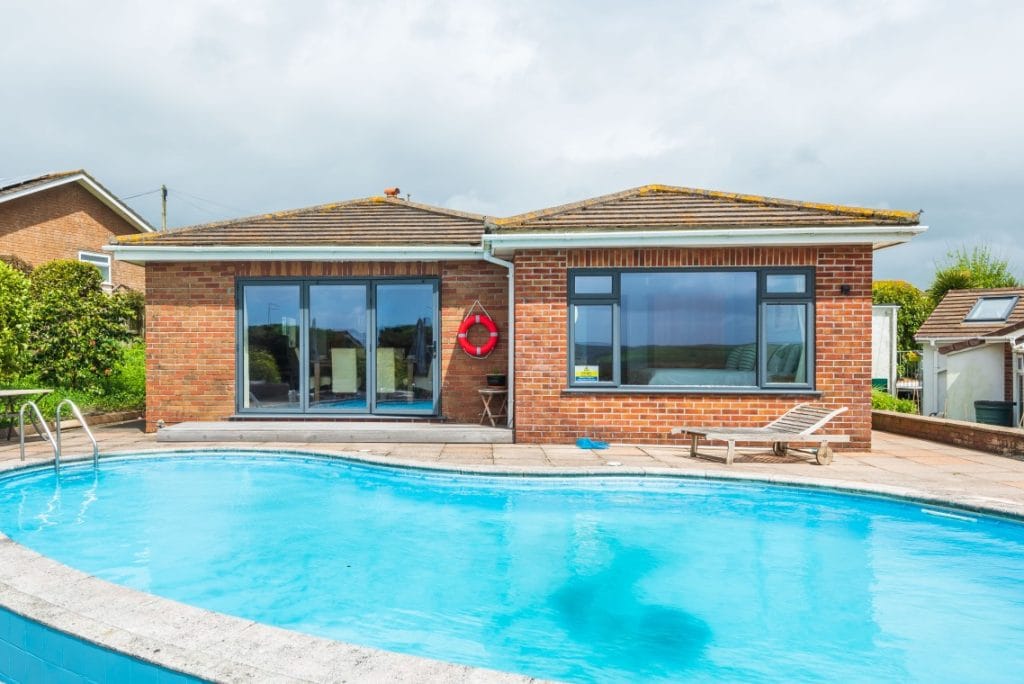 dog friendly coastal cottage with a pool