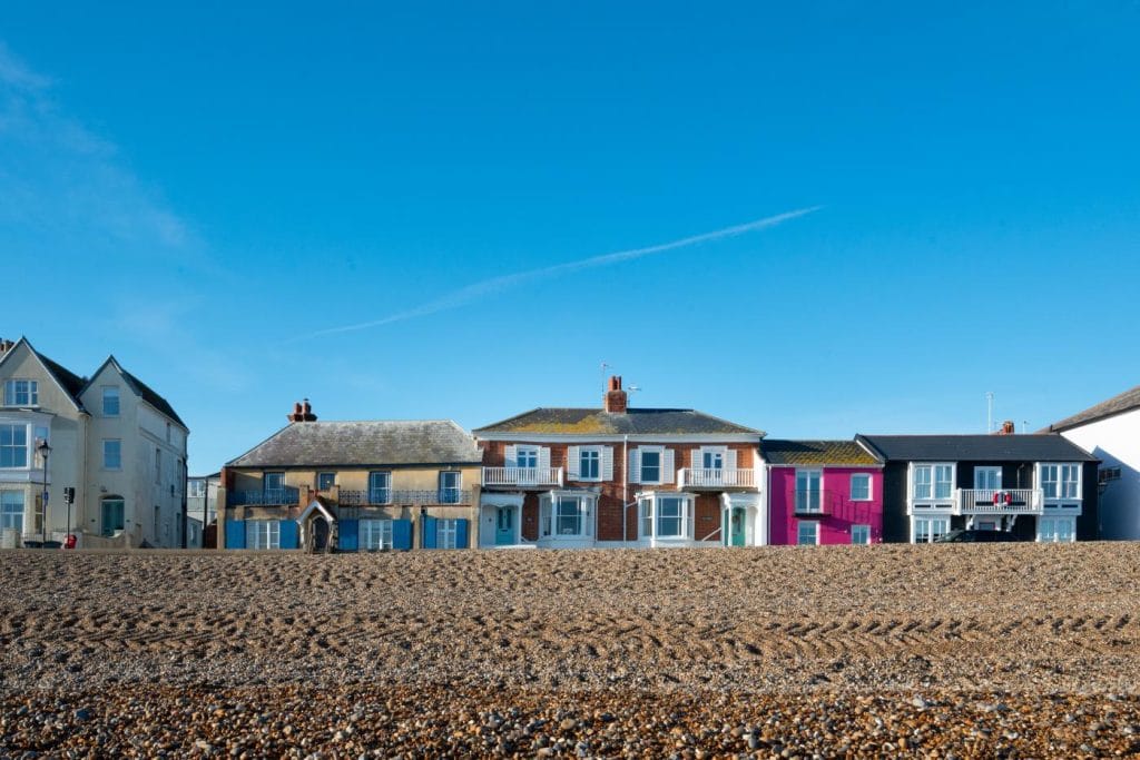 Colourful cottages on the shingle beach at Aldeburgh