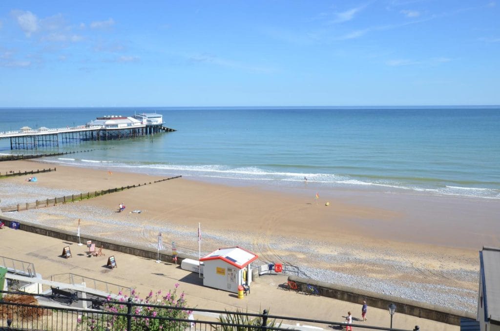 View of Cromer beach and pier from the promenade