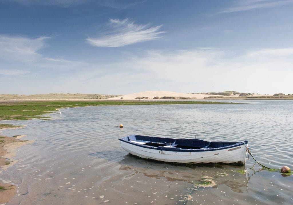 Boat in the shallows at Newburgh, Aberdeenshire