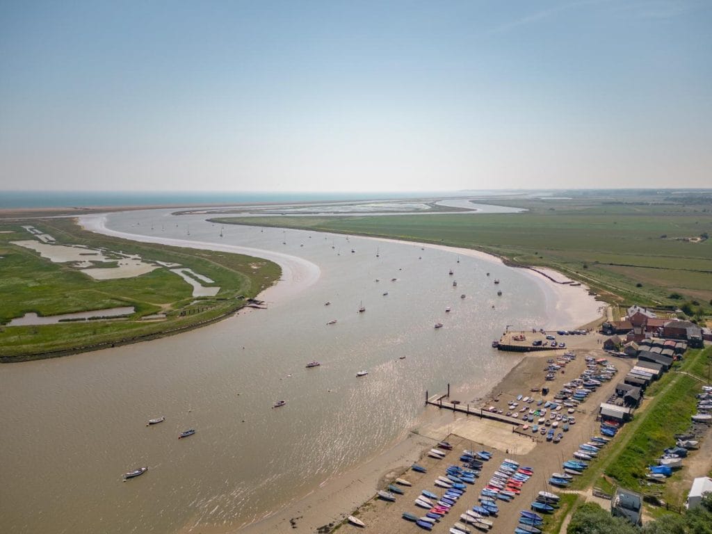 View of Orford River where it meets the sea on the Suffolk Coast