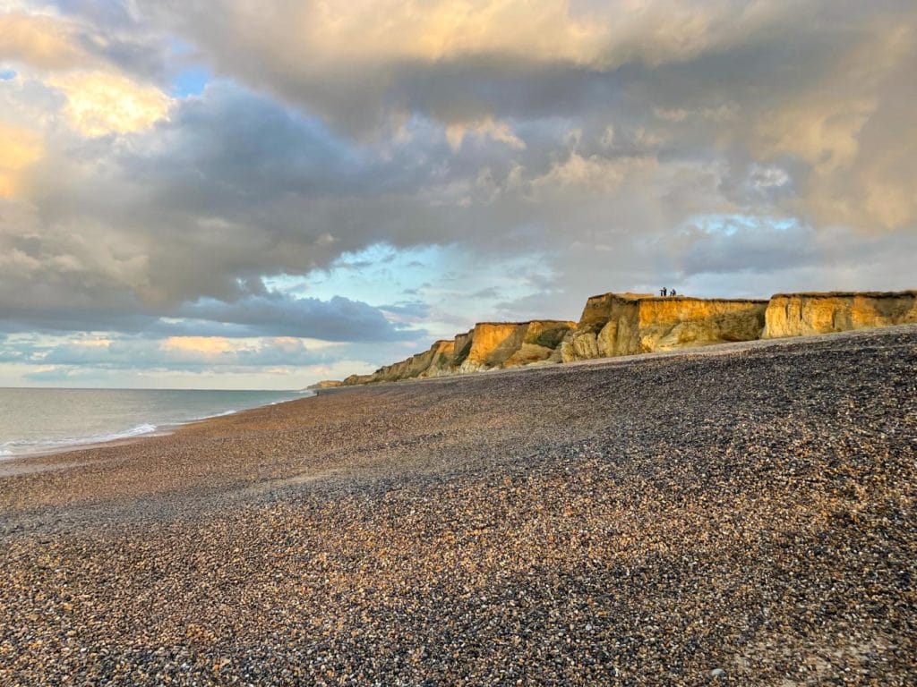 Weybourne Beach at dusk with clouds overhead