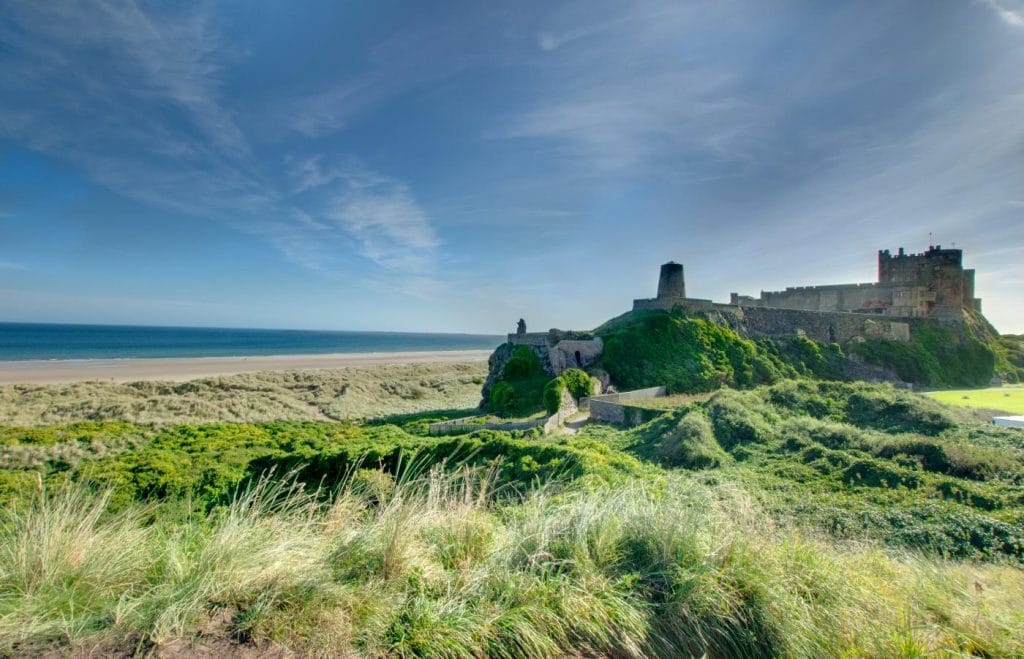 View from behind Bamburgh Castle showing the beach