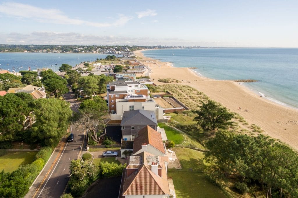 Row of UK holiday homes with sea views and direct beach access
