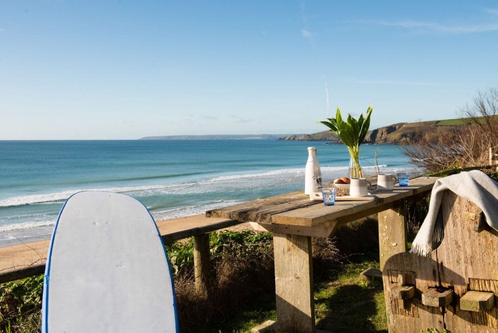 Back garden of a luxury beach home with sea views