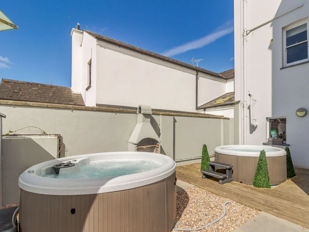 Pembrokeshire holiday home with two hot tubs in the garden