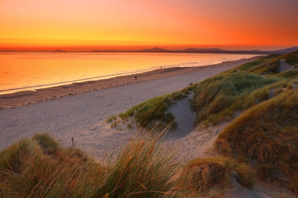 Harlech Beach at dusk with sunset