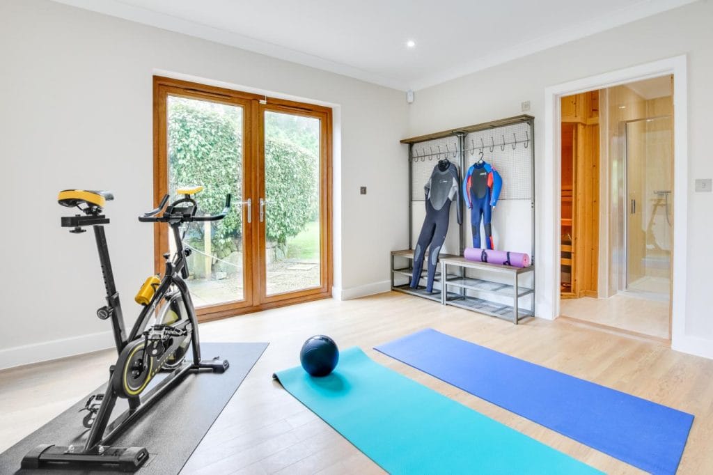 Indoor gym with exercise bike in Cornwall