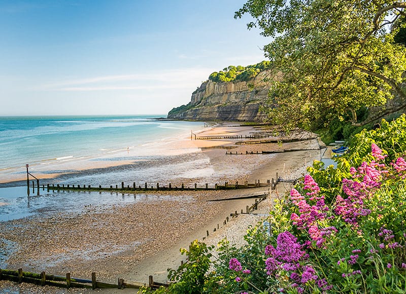 Shanklin Beach with gentle waves rolling in