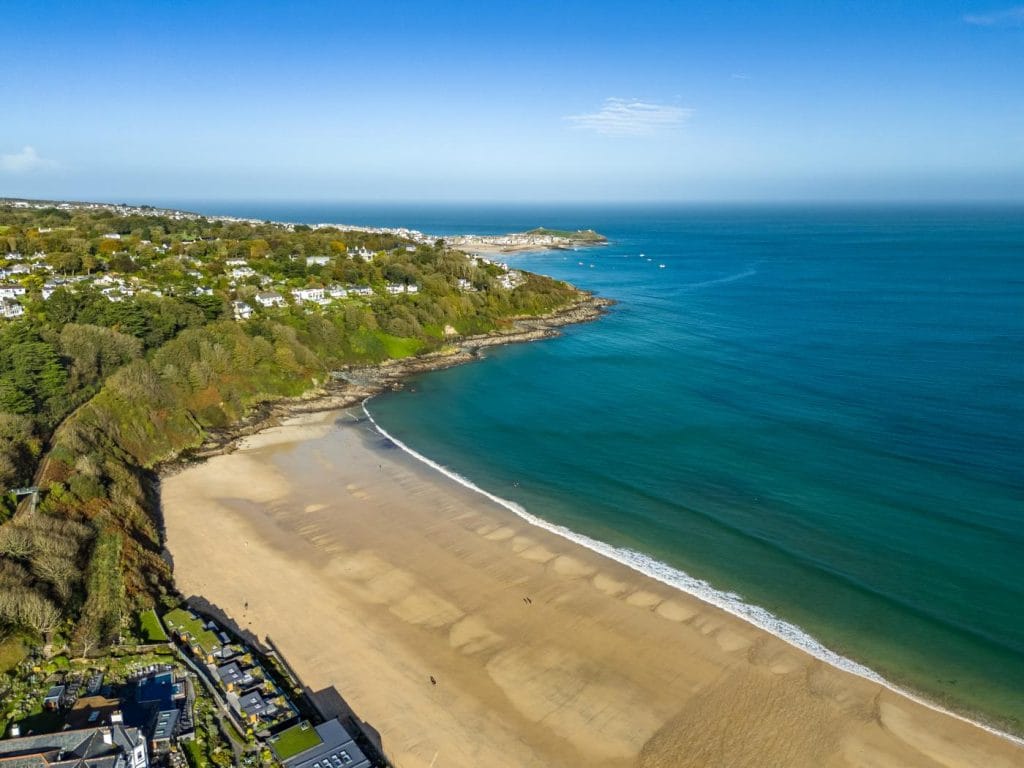 The turquoise water and sandy beach at Carbis Bay