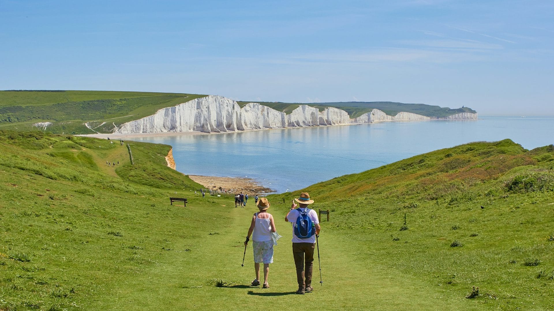 Coastal walkers overlooking the Seven Sisters in East Sussex