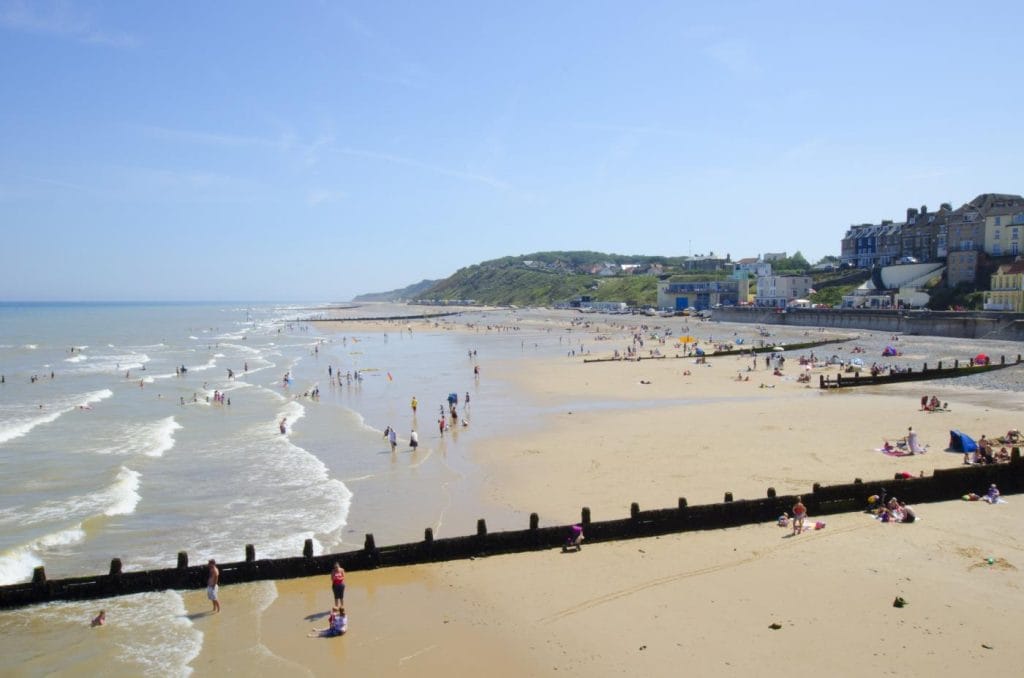 Lots of people on Cromer beach in summer