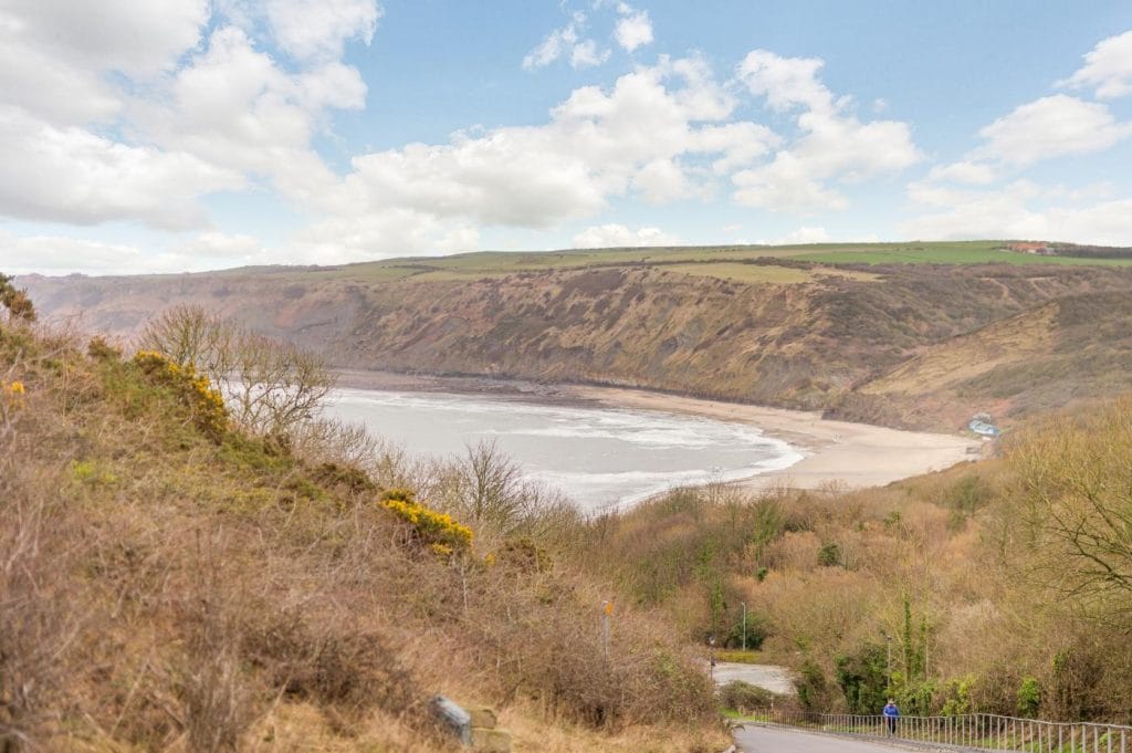 Long sandy beach at Runswick Bay in Yorkshire