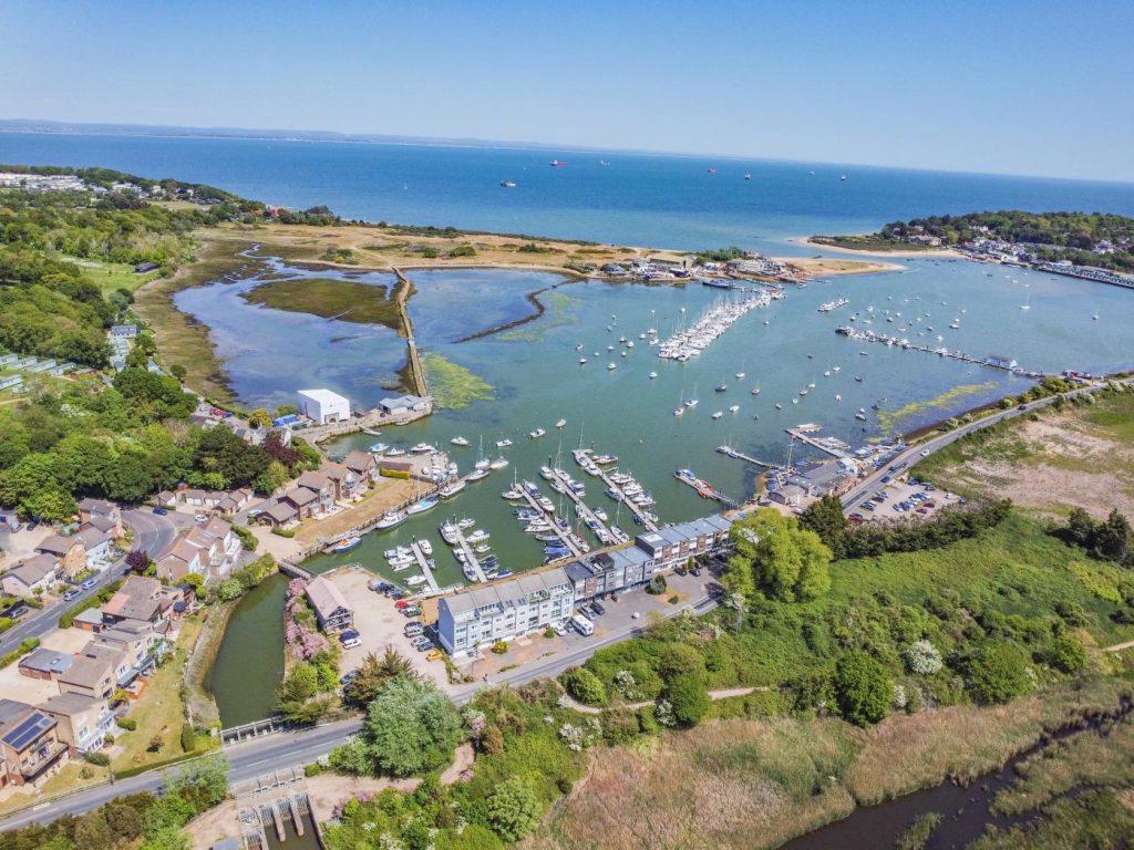 Aerial view of Bembridge harbour on a busy summer's day.
