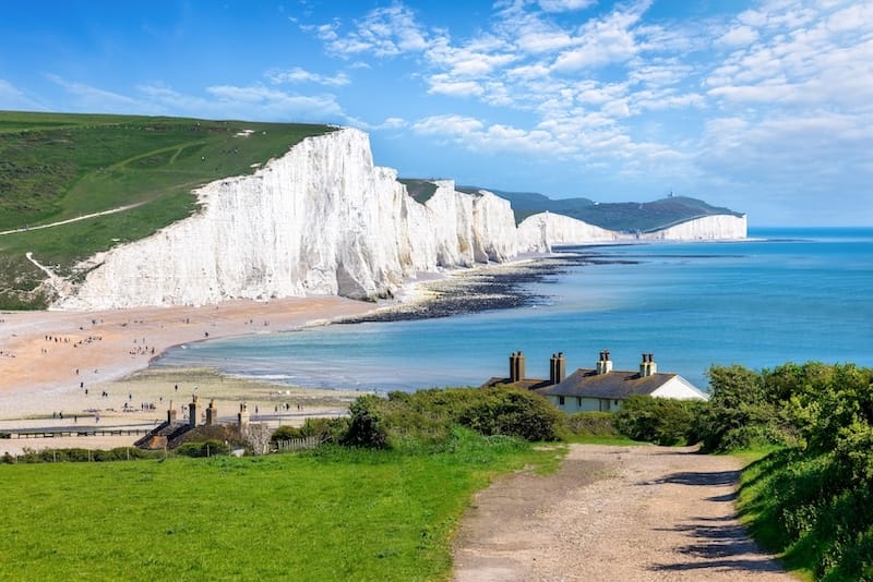 The Seven Sisters Chalk cliffs and a cottage in Seaford, East Sussex, England