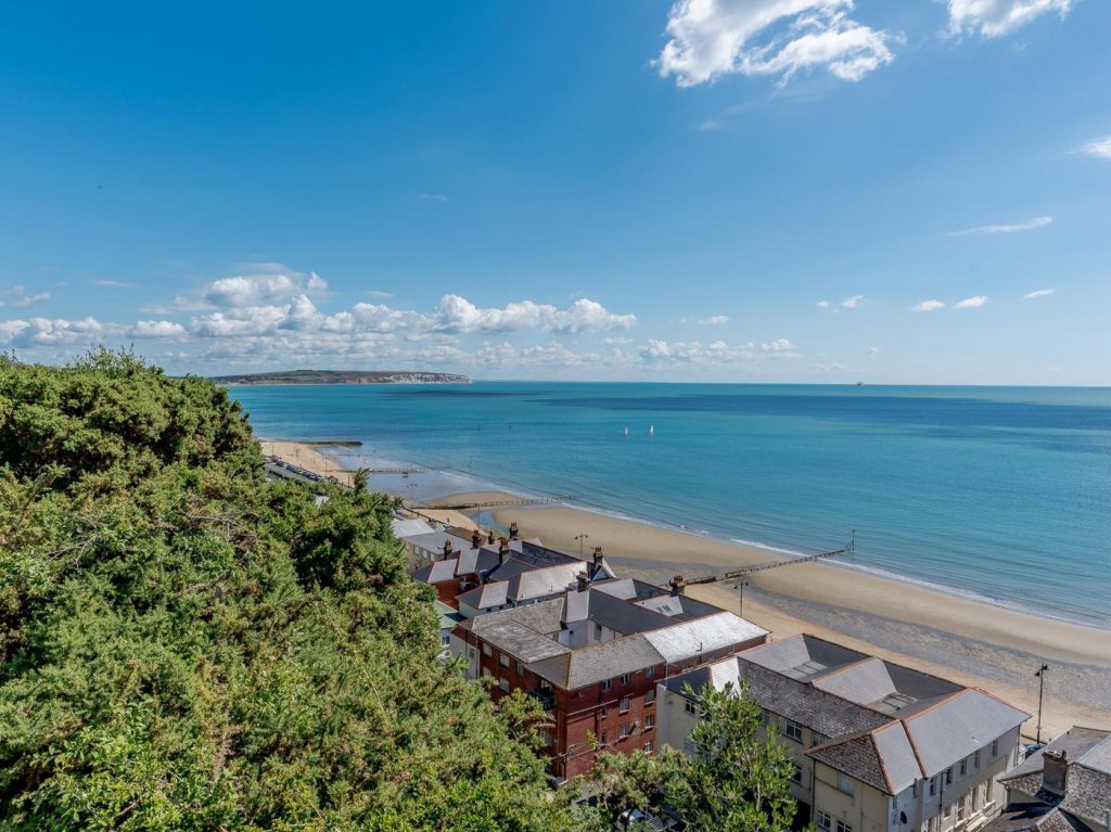 Looking over a row of beachfront houses on Shanklin Beach, Isle of Wight.