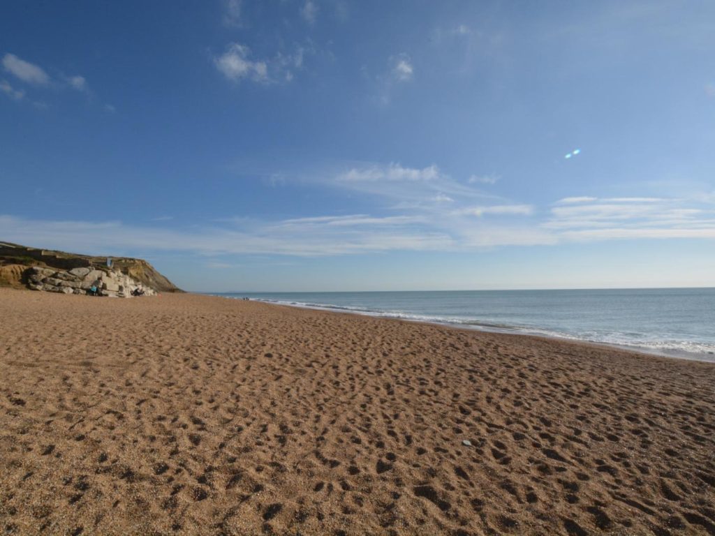 Looking across Hive Beach at Burton Bradstock in Dorset, England, UK.