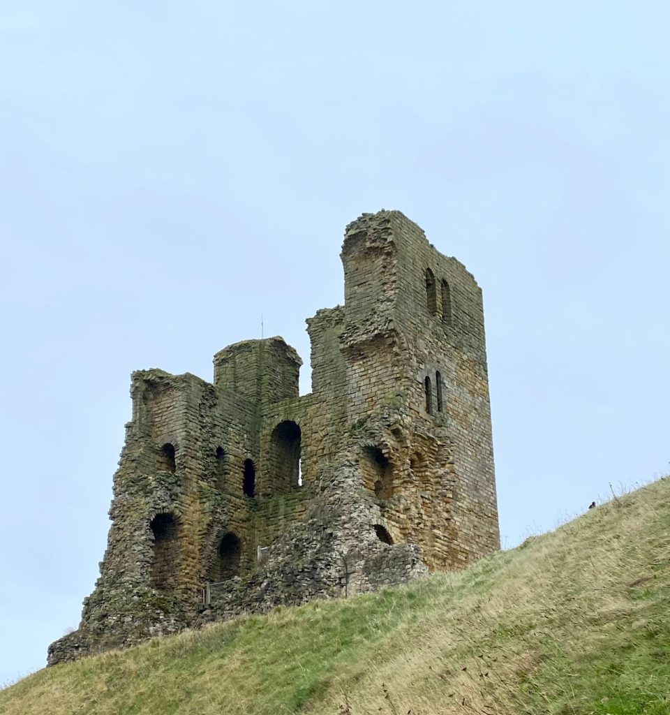 Looking up at the ancient ruins of Scarborough Castle.