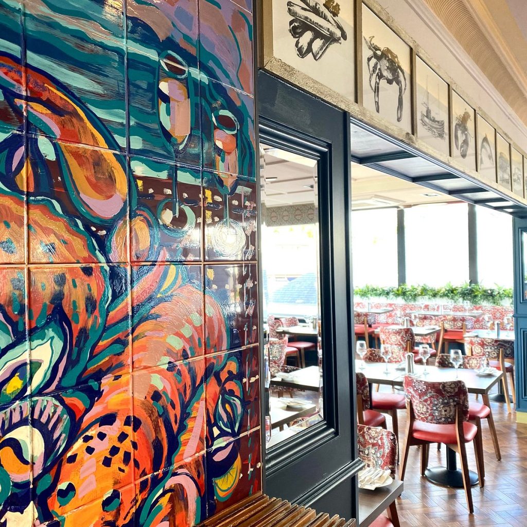 The mural on the wall at the Waterfront Fishouse Restaurant in Scotland.