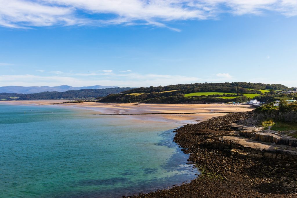Aerial view of the wide sandy beach at Benllech, Anglesey, North Wales.