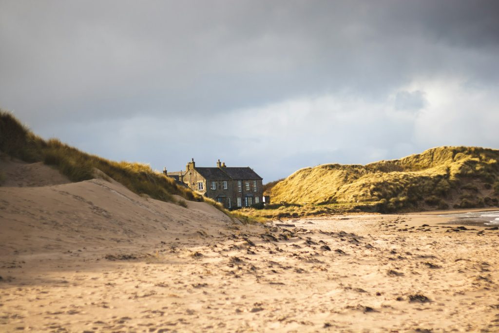 Cottage on the beach at Seahouses, Northumberland, UK.