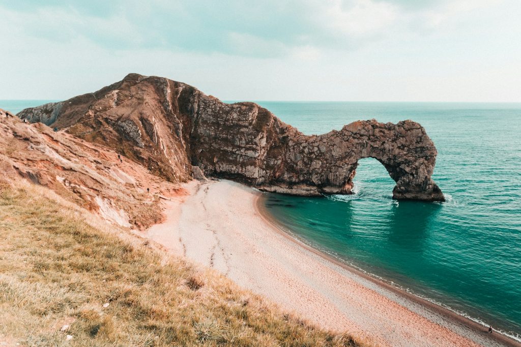 The iconic rock formation at Durdle Door, Dorset Coast, UK.