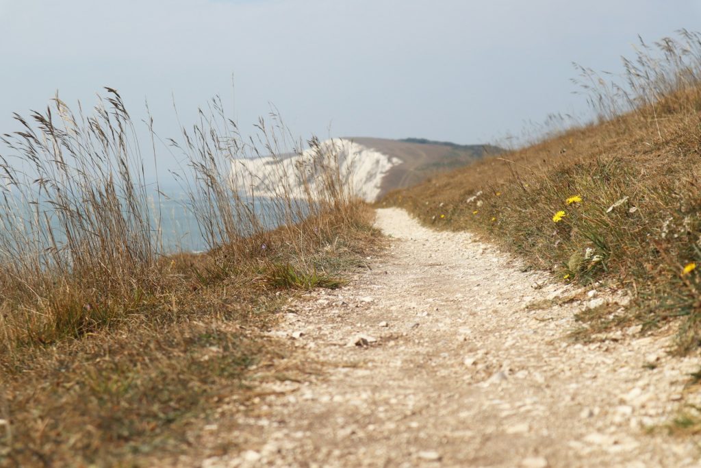 The coastal path to Freshwater Bay on the Isle of Wight, UK.