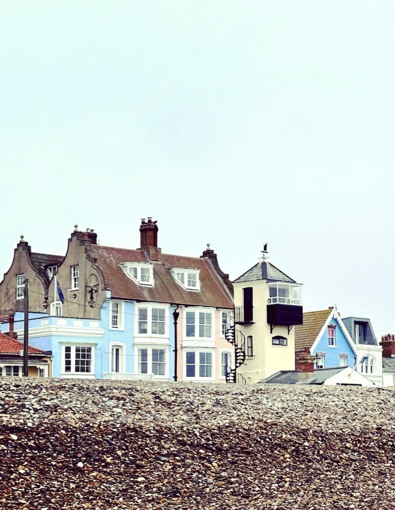Row of seafront cottages on Aldeburgh Beach, Suffolk.
