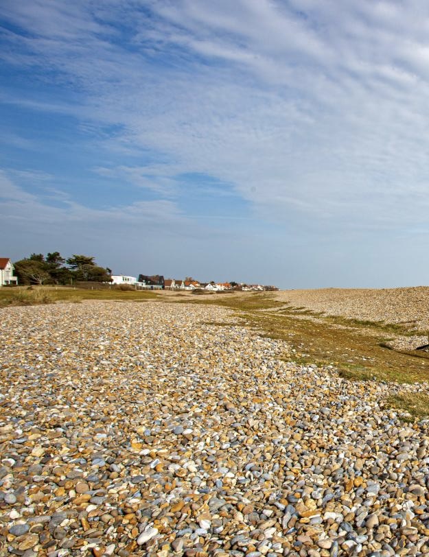 Shingle beach at Thorpeness, Suffolk, UK.